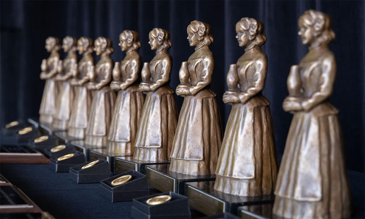 A row of Nighingale award statuettes.